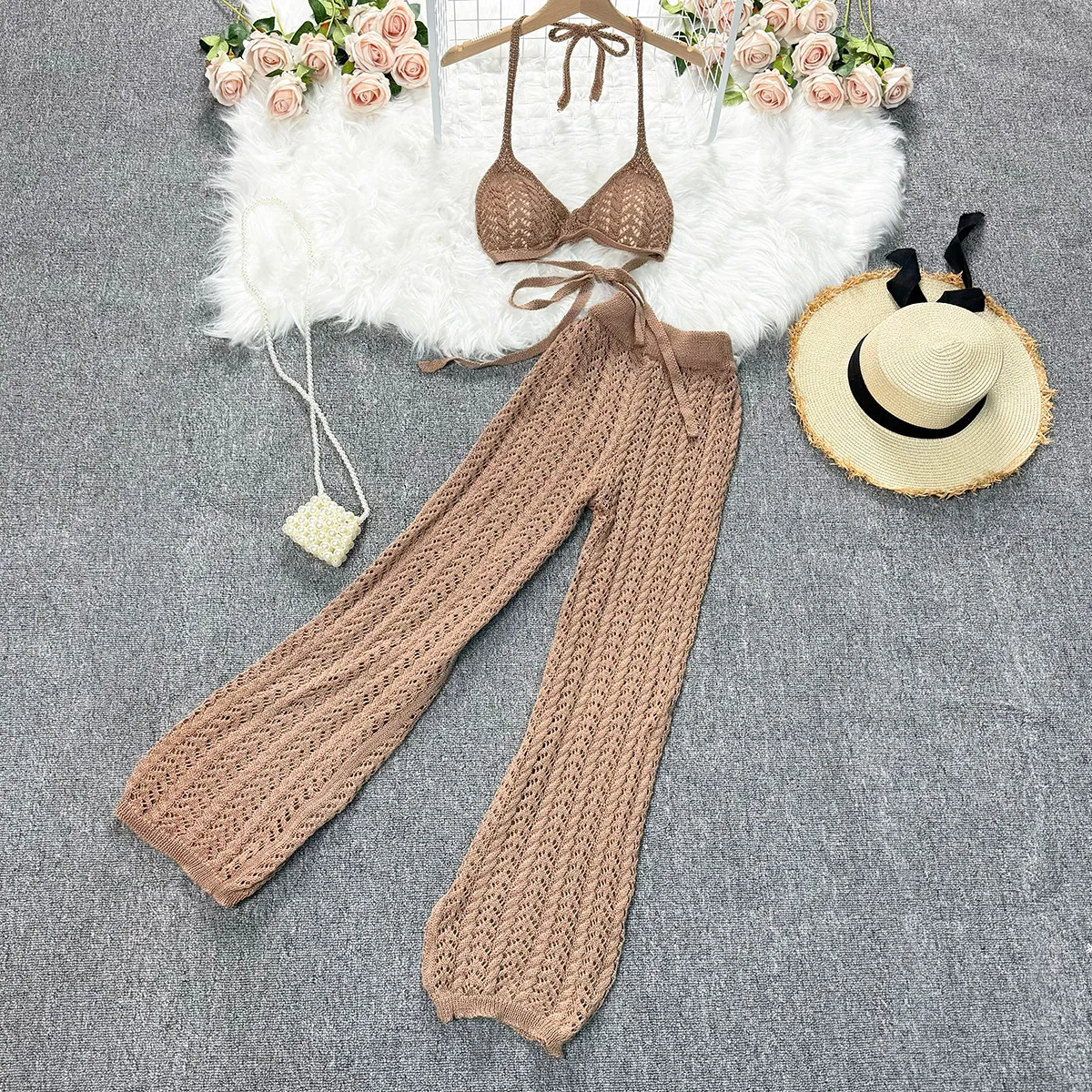 Beach vacation set, women's summer outfit, sexy bikini strap hanging neck top, design sense, hollowed out knitted wide leg pants