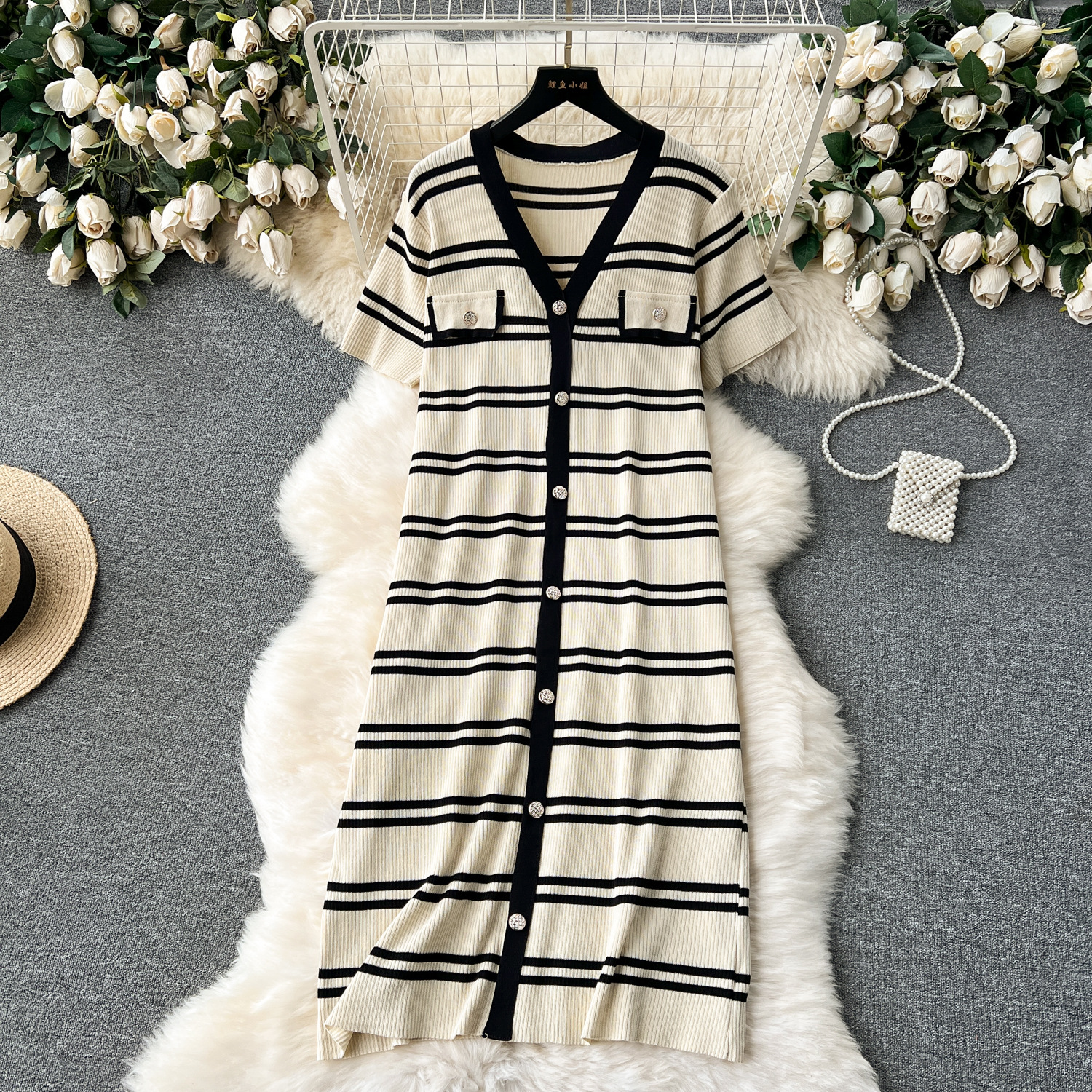 Lazy person early spring Korean style outfit with retro striped temperament V-neck breasted mid length knitted dress 2024 new model