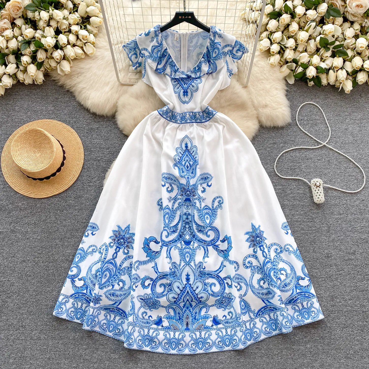 French court style retro print design with ruffle edge V-neck and waist closure for a slim and elongated look. This is a stylish spring dress