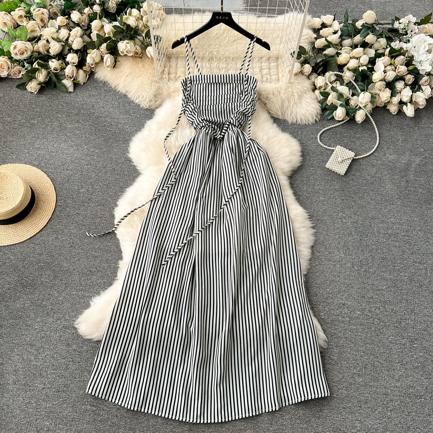 High end travel photography vacation style skirt design with pressure pleats, slim fit, long suspender skirt, striped dress for women