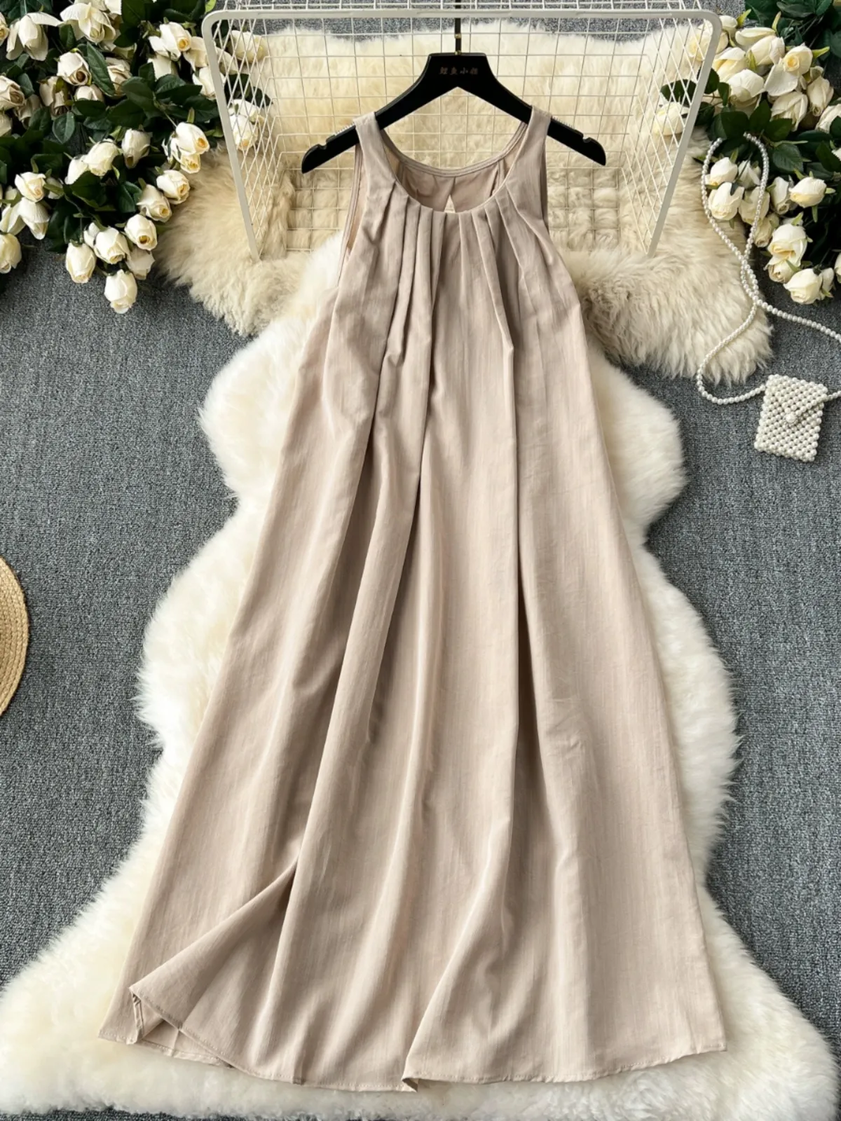 Sleeveless vest dress, women's summer seaside vacation style, loose and casual hanging neck fairy dress, French slimming long dress