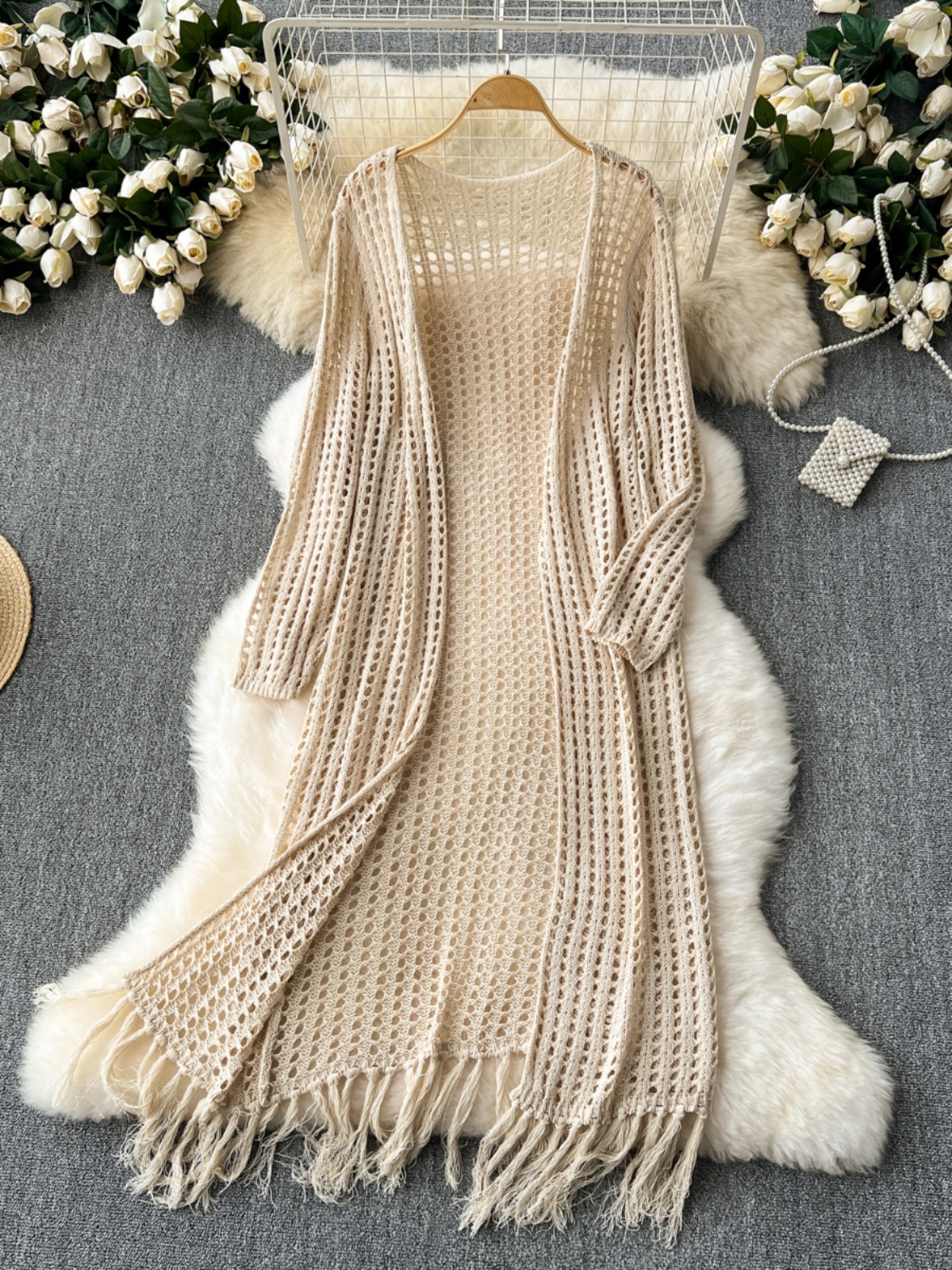 High end and lazy style mid length cardigan shawl for women's beach vacation, tourism, sun protection, hollowed out knitted tassel jacket