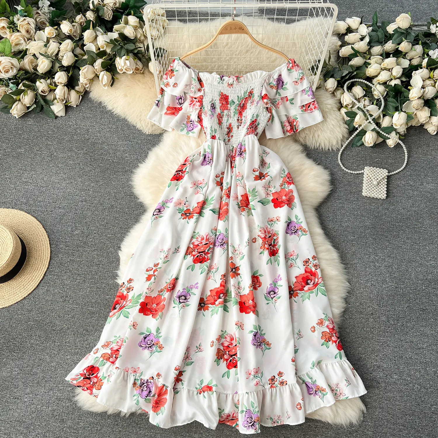 French holiday dress for women in early spring 2024, new one line neckline off the shoulder short sleeved waist long floral platycodon skirt
