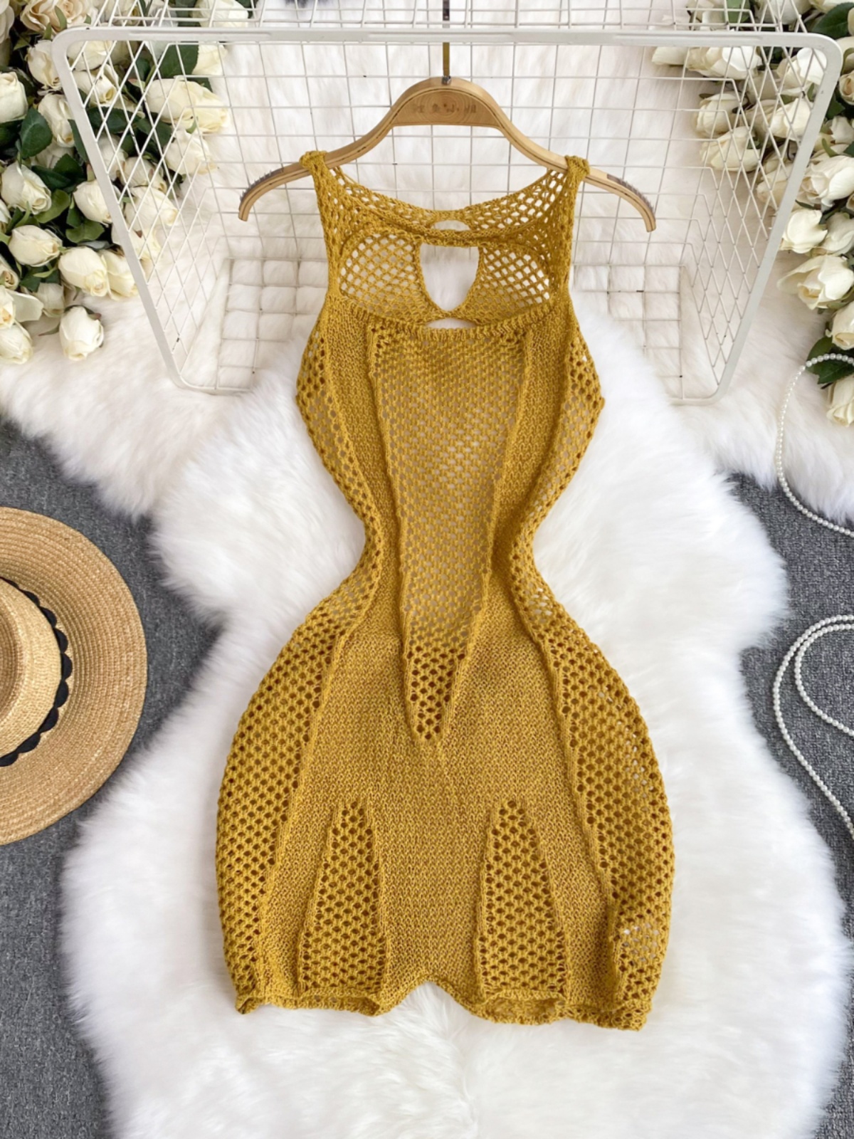 European and American foreign trade women's summer new sexy hollow out knitted jumpsuit, showing off body shape, casual bag buttocks jumpsuit shorts