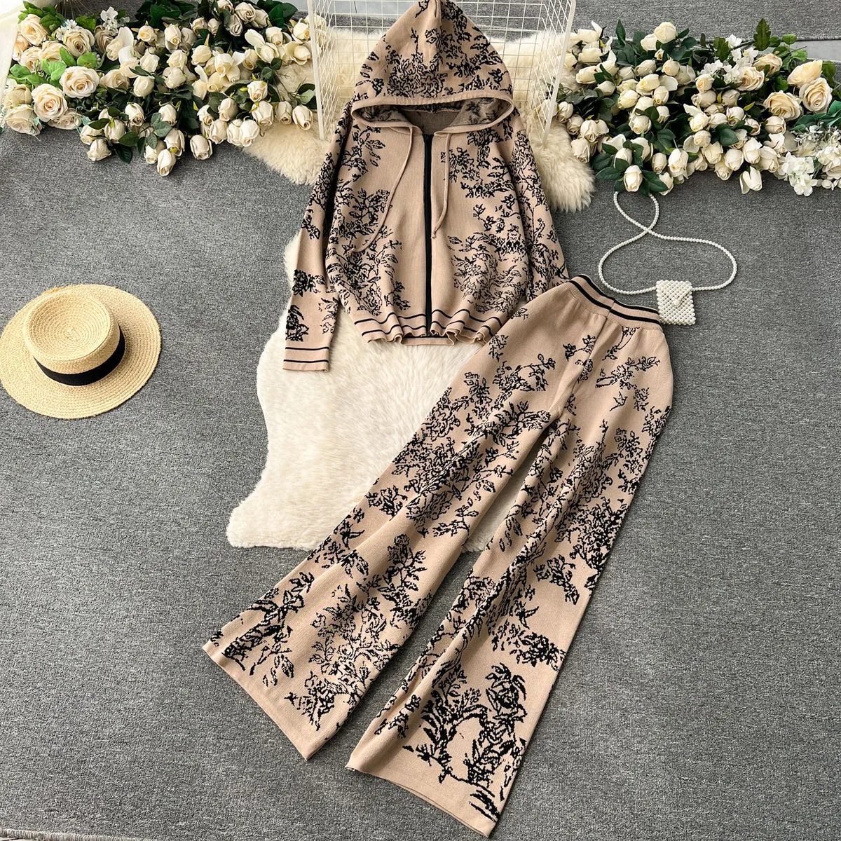 Leisure, fashionable, sports, and age reducing knitted sweater two-piece set for women's high-end printed hooded sweater with high waist and wide leg pants