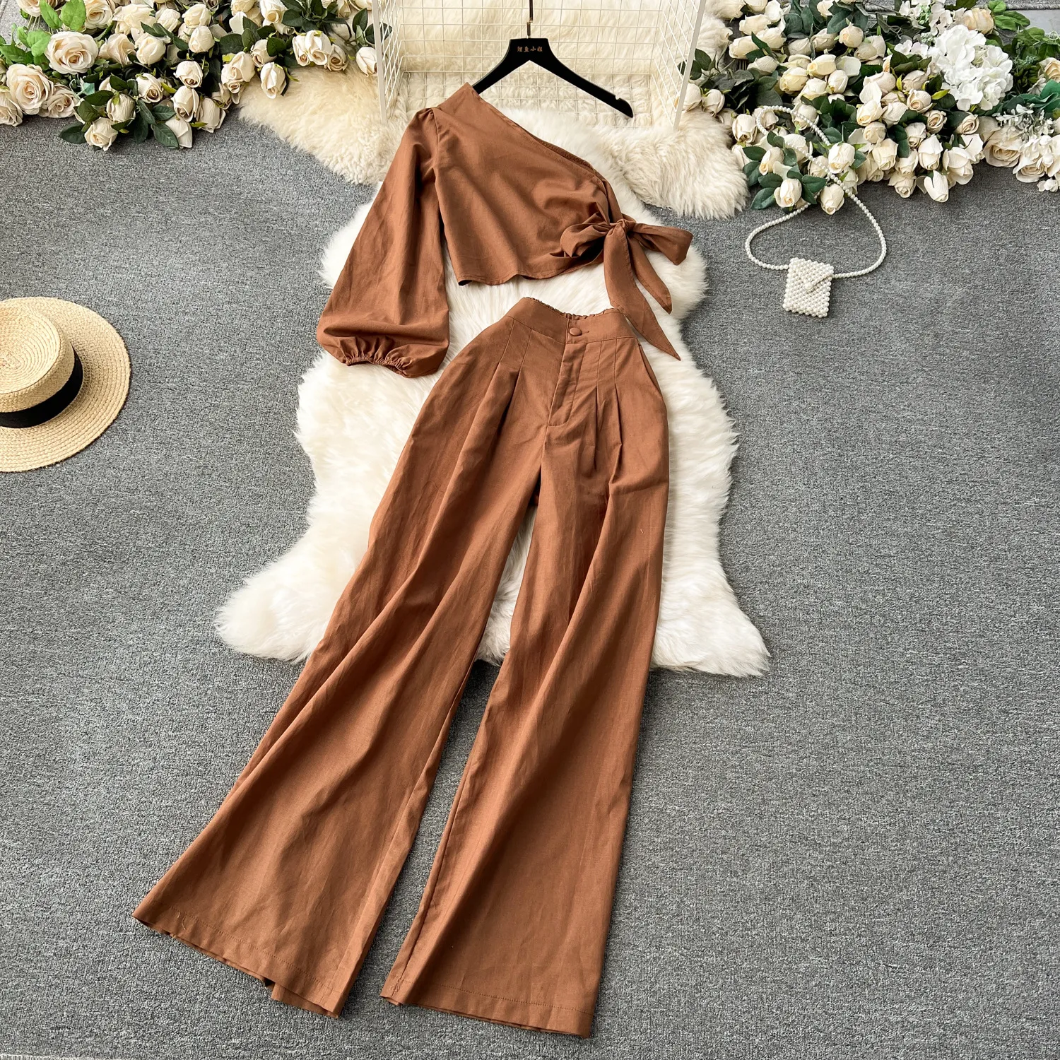 European and American spring clothing women's design sense slanted collar off the shoulder bubble sleeve top high waisted slimming wide leg pants fashion two-piece set