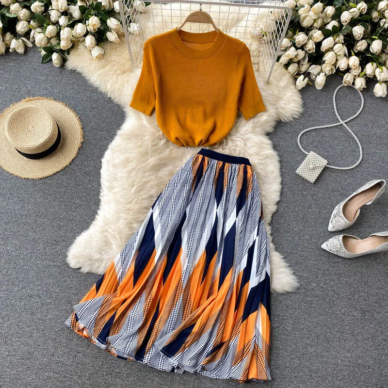 Elegant set for women's summer wear, knitted short sleeved top, versatile high waisted design, contrasting diamond checkered skirt, two-piece set